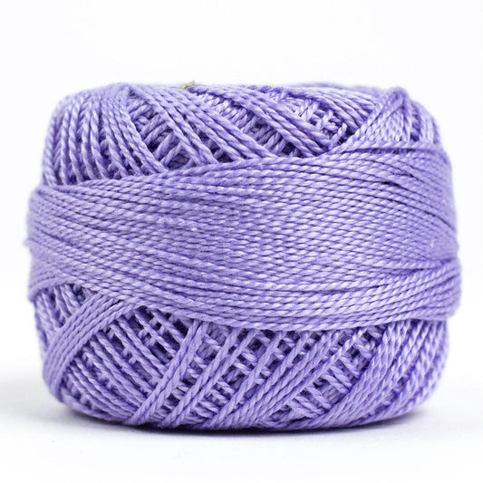 Side view of Perle cotton ball on white background to show color