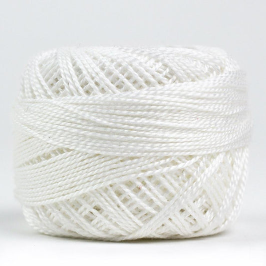 Side view of Perle cotton ball on white background to show color