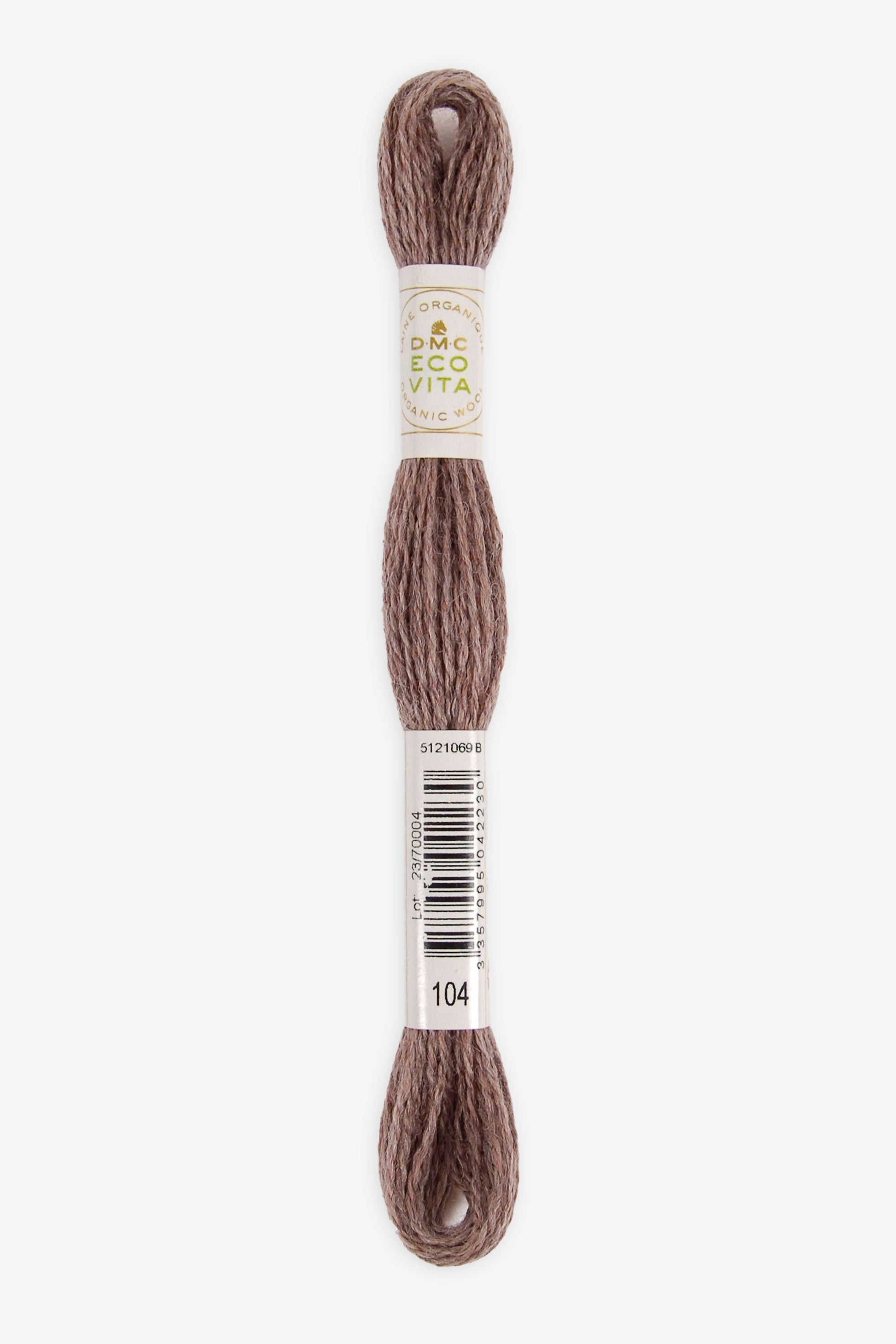 Single skein of Eco Vita Crewel Wool thread from DMC in color #104 against a white background