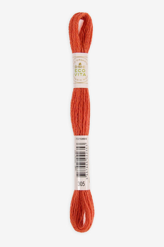 Single skein of Eco Vita Crewel Wool thread from DMC in color #305 against a white background