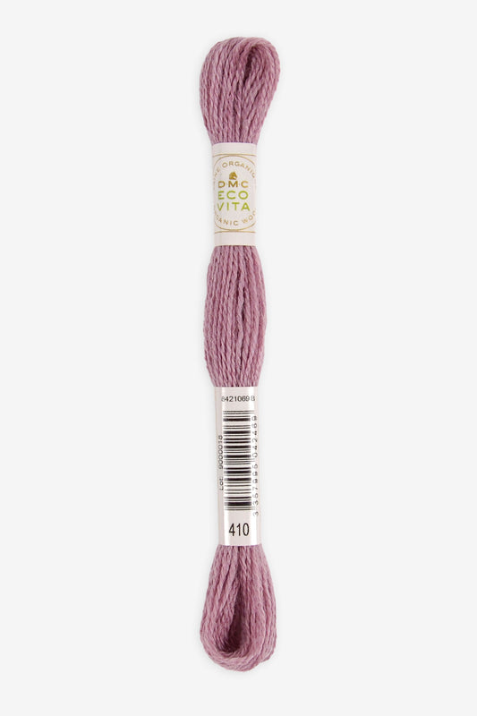 Single skein of Eco Vita Crewel Wool thread from DMC in color #410 against a white background