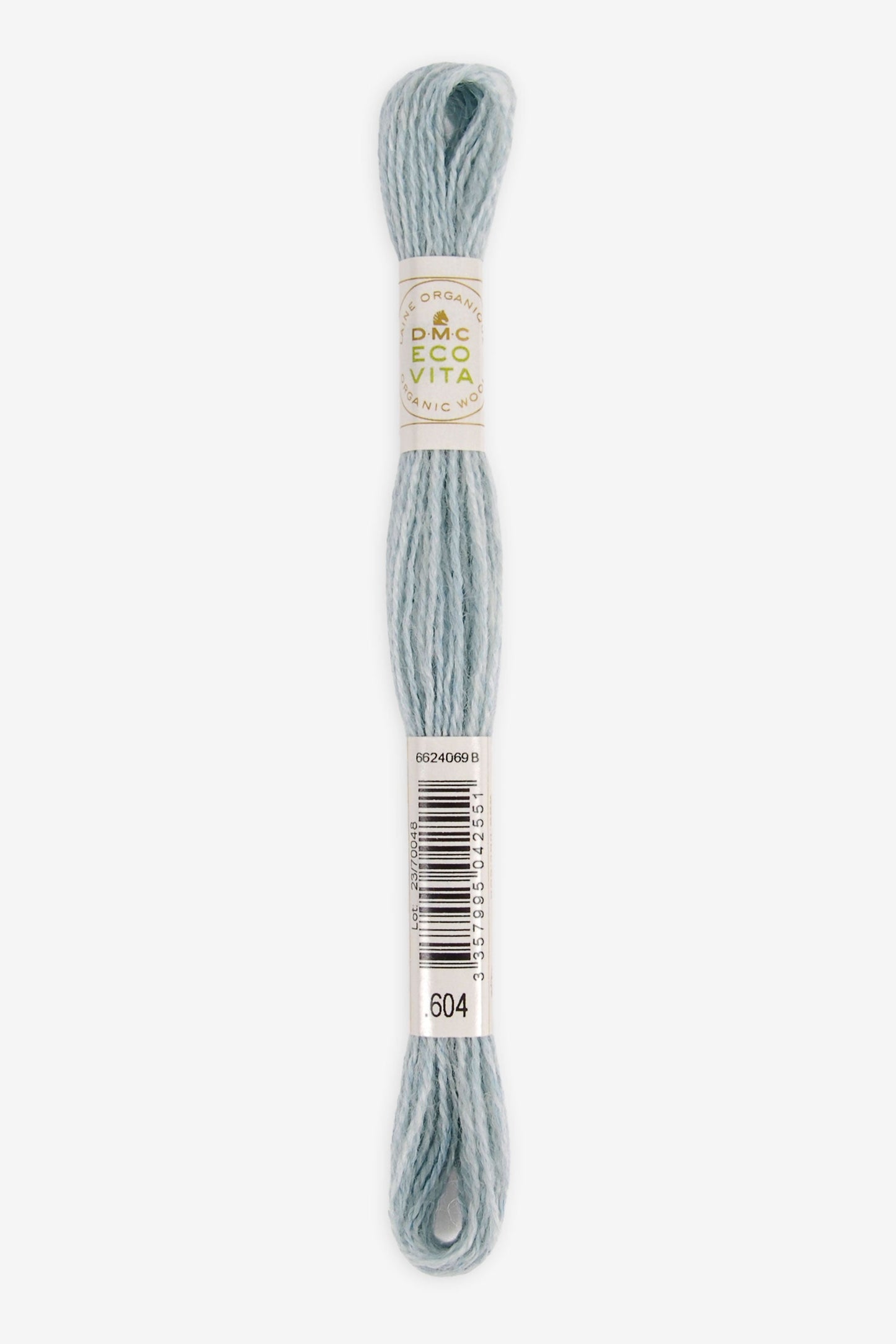 Single skein of Eco Vita Crewel Wool thread from DMC in color #604 against a white background