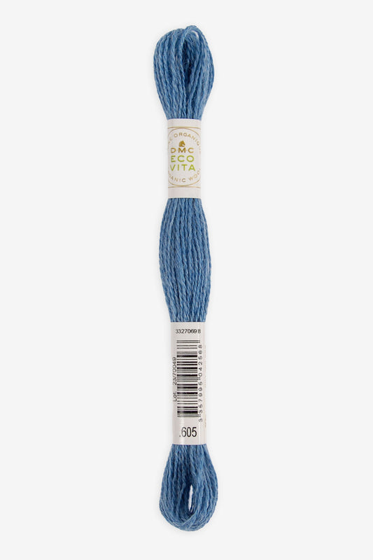 Single skein of Eco Vita Crewel Wool thread from DMC in color #605 against a white background