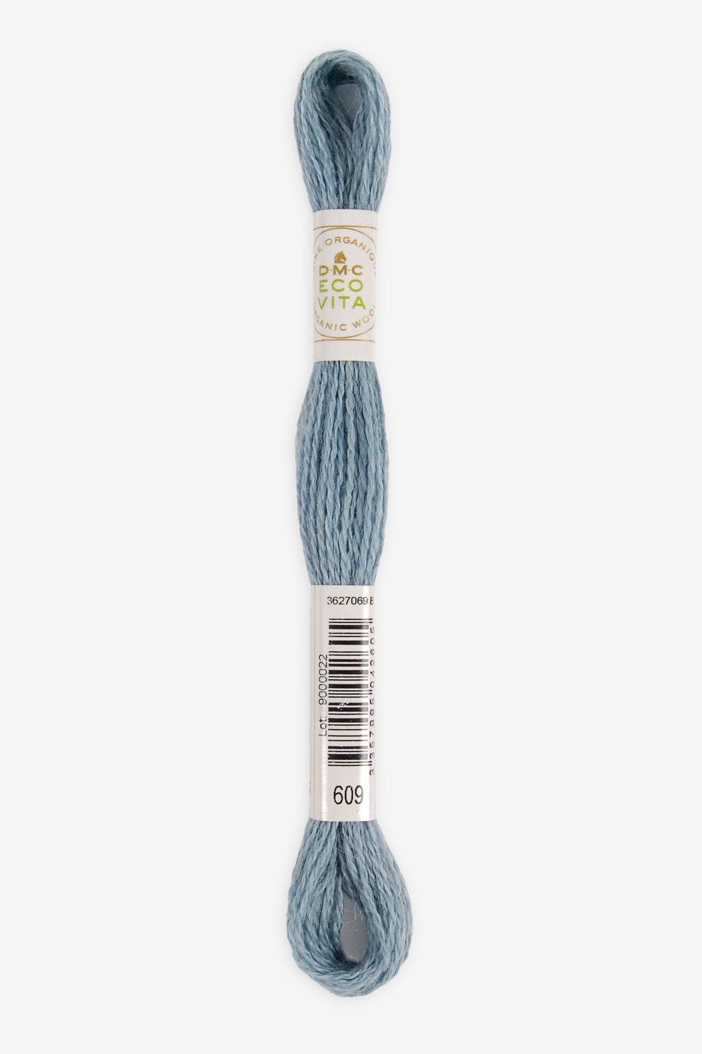 Single skein of Eco Vita Crewel Wool thread from DMC in color #609 against a white background