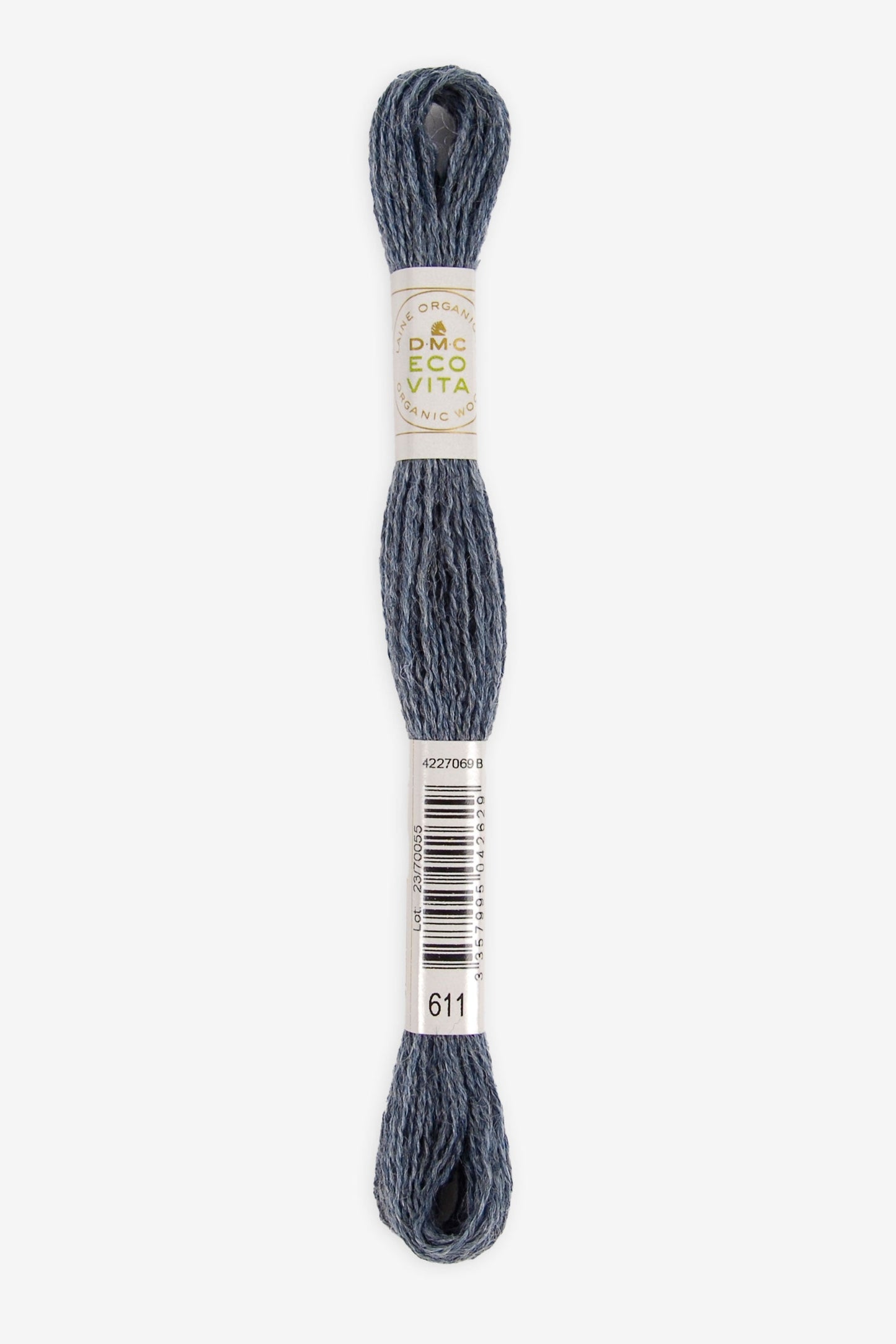 Single skein of Eco Vita Crewel Wool thread from DMC in color #611 against a white background