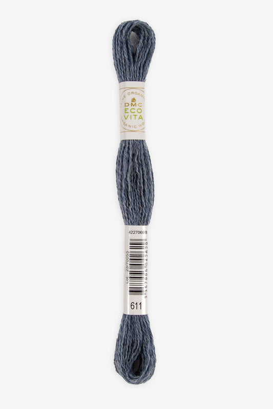 Single skein of Eco Vita Crewel Wool thread from DMC in color #611 against a white background