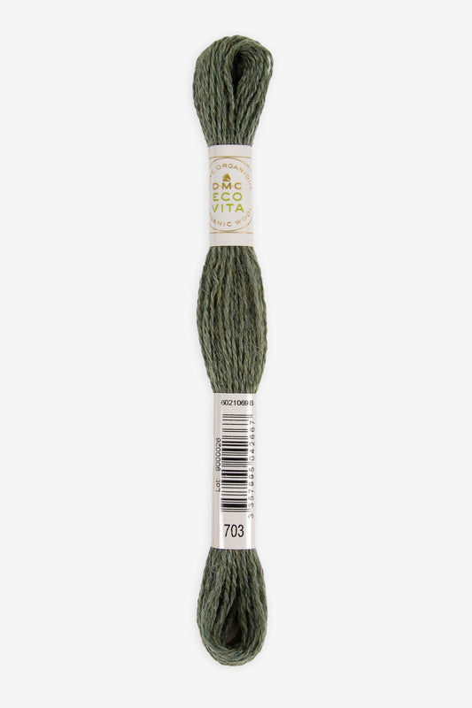 Single skein of Eco Vita Crewel Wool thread from DMC in color #703 against a white background