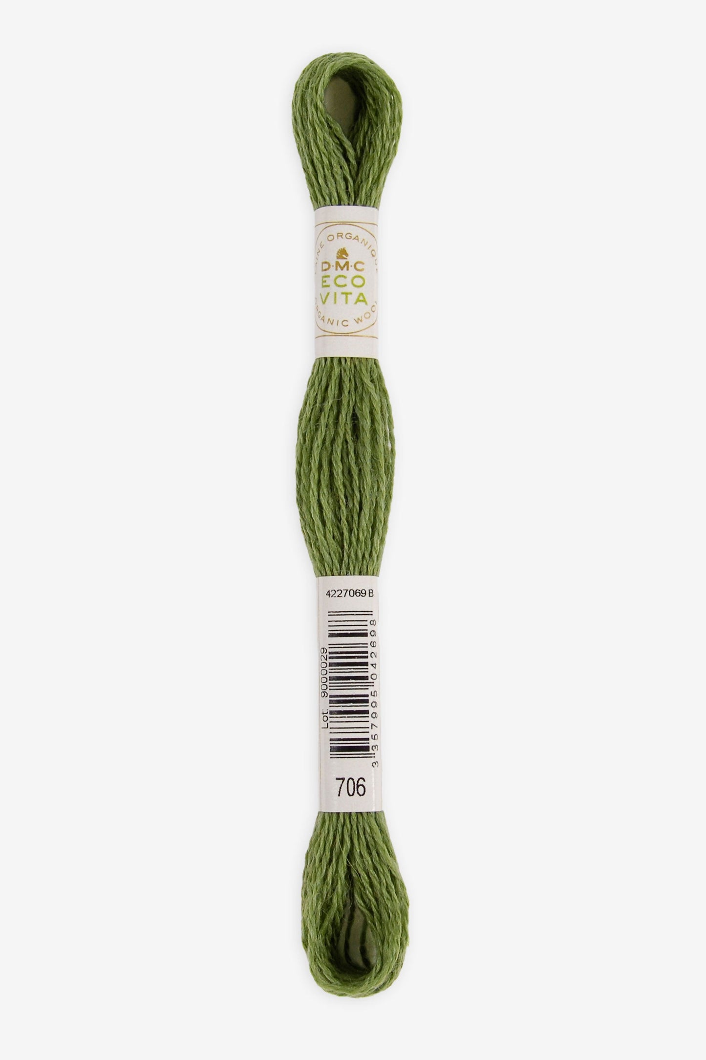 Single skein of Eco Vita Crewel Wool thread from DMC in color #706 against a white background