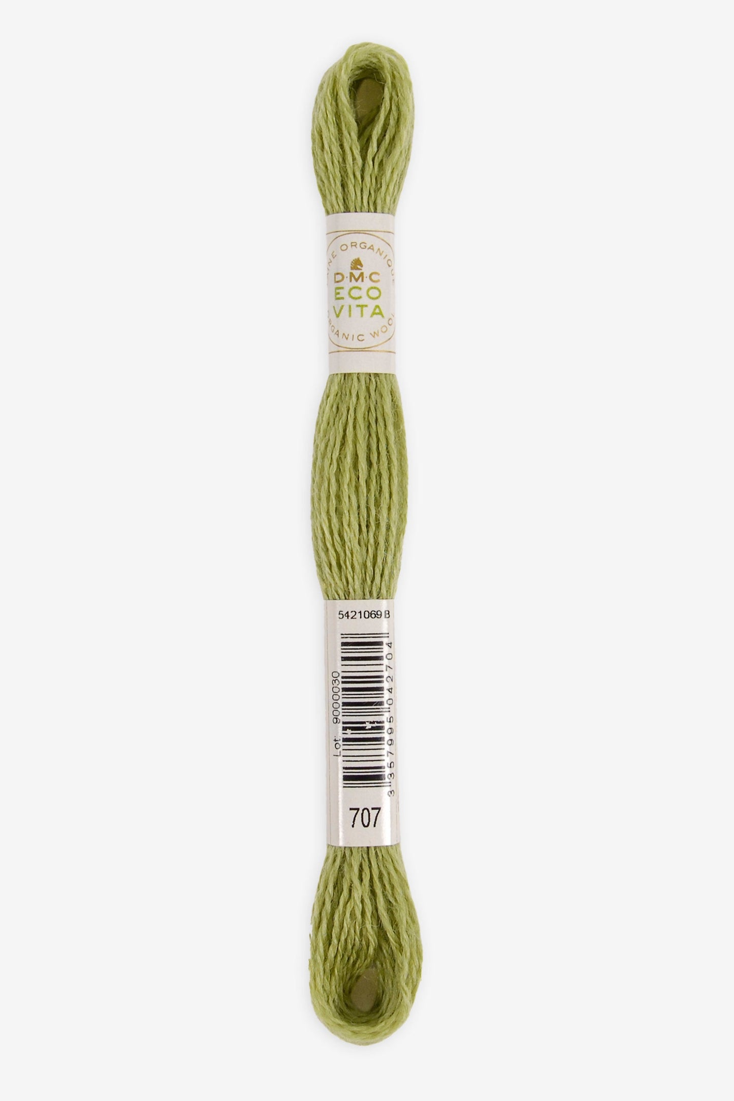 Single skein of Eco Vita Crewel Wool thread from DMC in color #707 against a white background