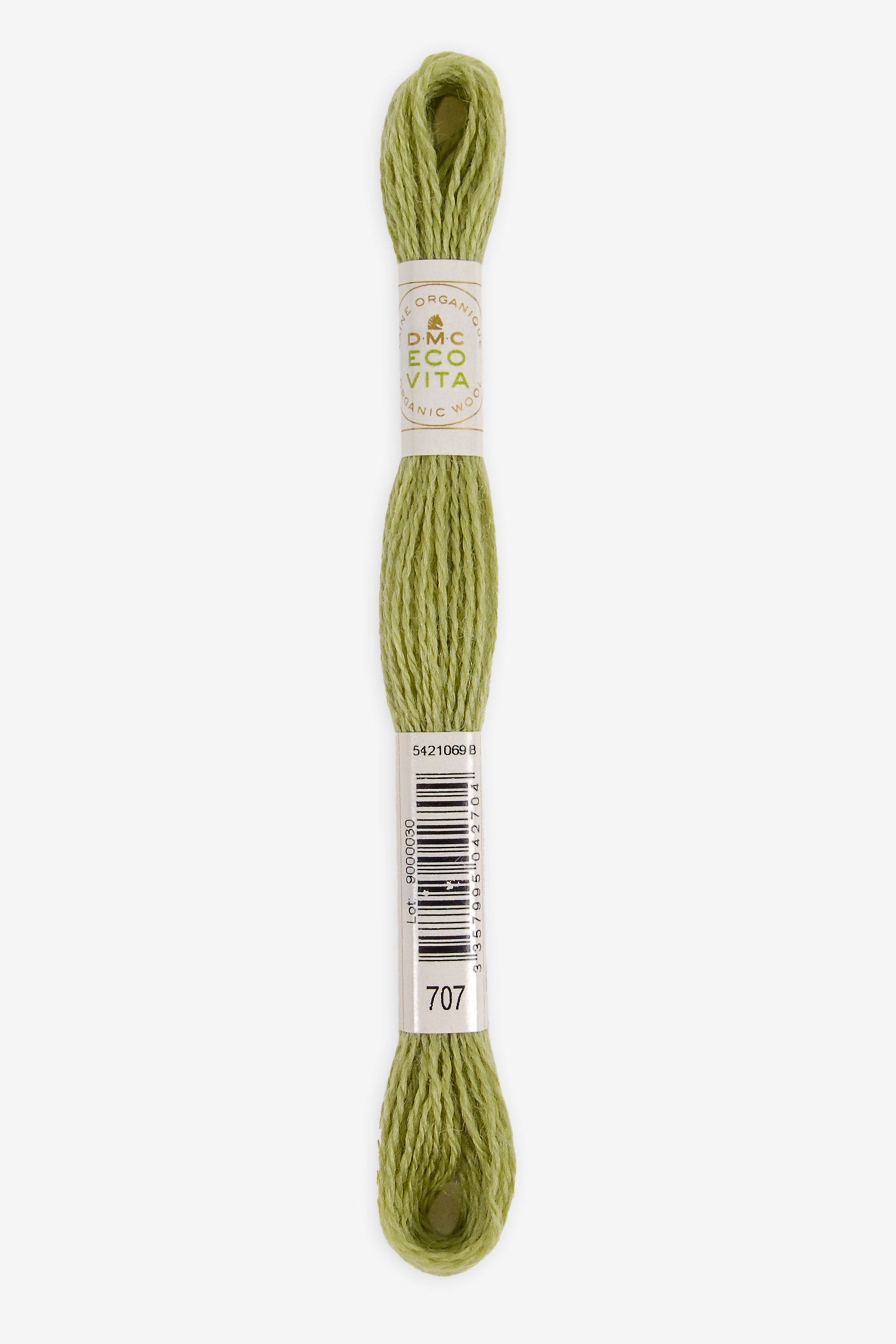 Single skein of Eco Vita Crewel Wool thread from DMC in color #707 against a white background