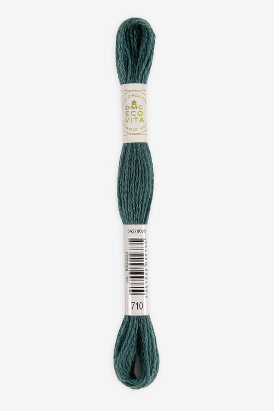 Single skein of Eco Vita Crewel Wool thread from DMC in color #710 against a white background