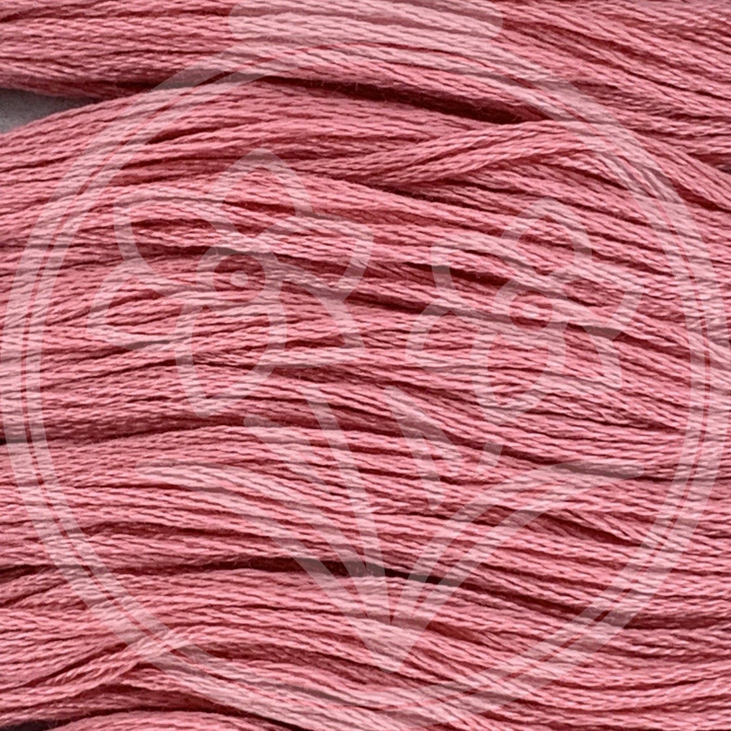 Closeup of multiple skeins, with a logo watermark