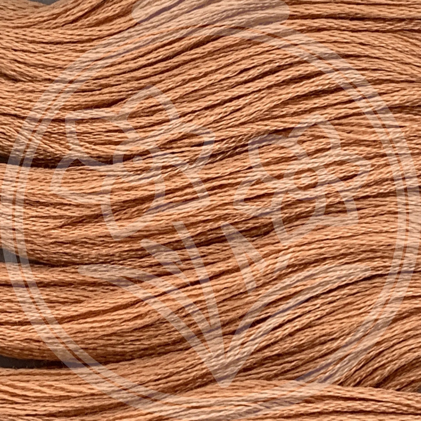 Closeup of multiple skeins, with a logo watermark