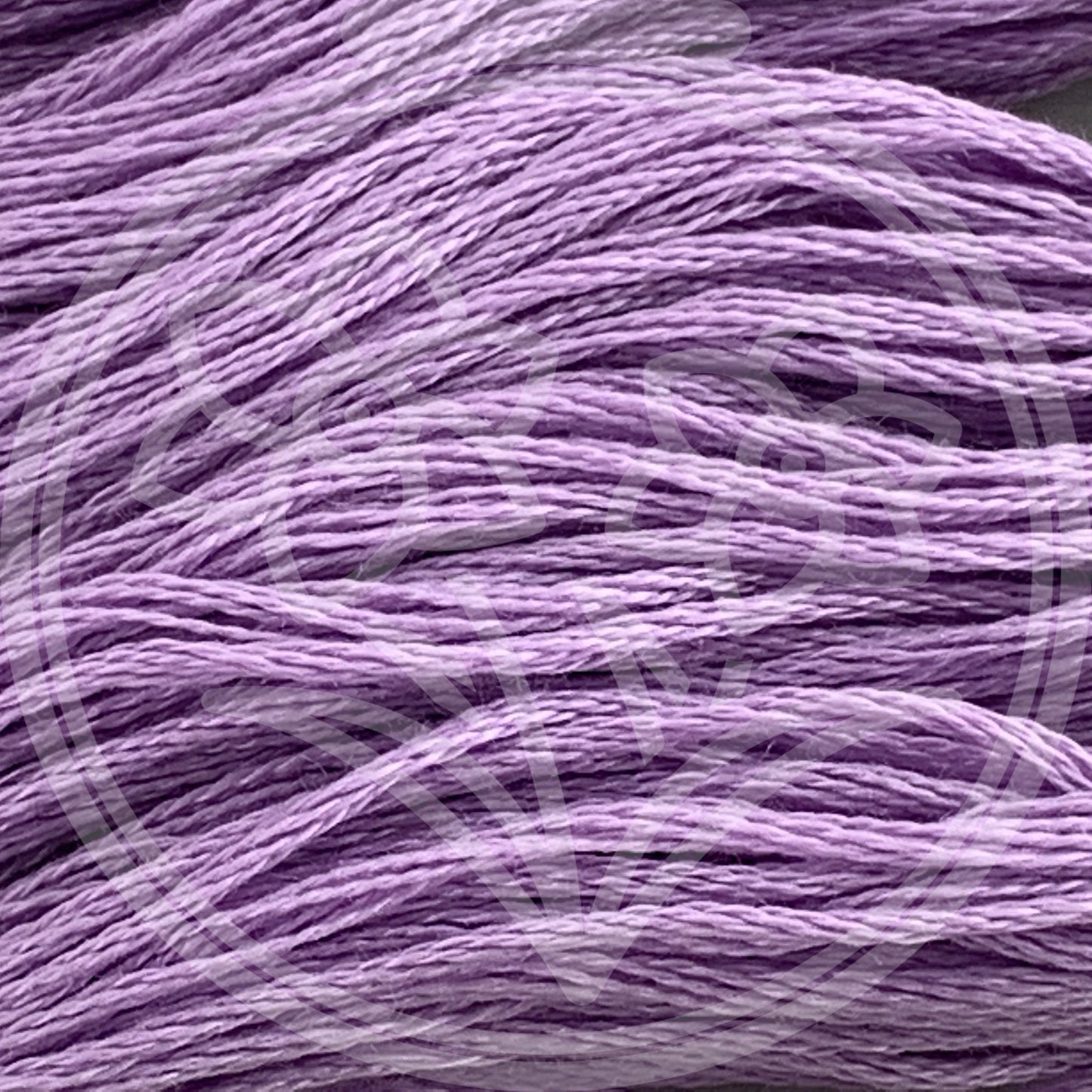 Closeup of multiple skeins, with a logo watermark