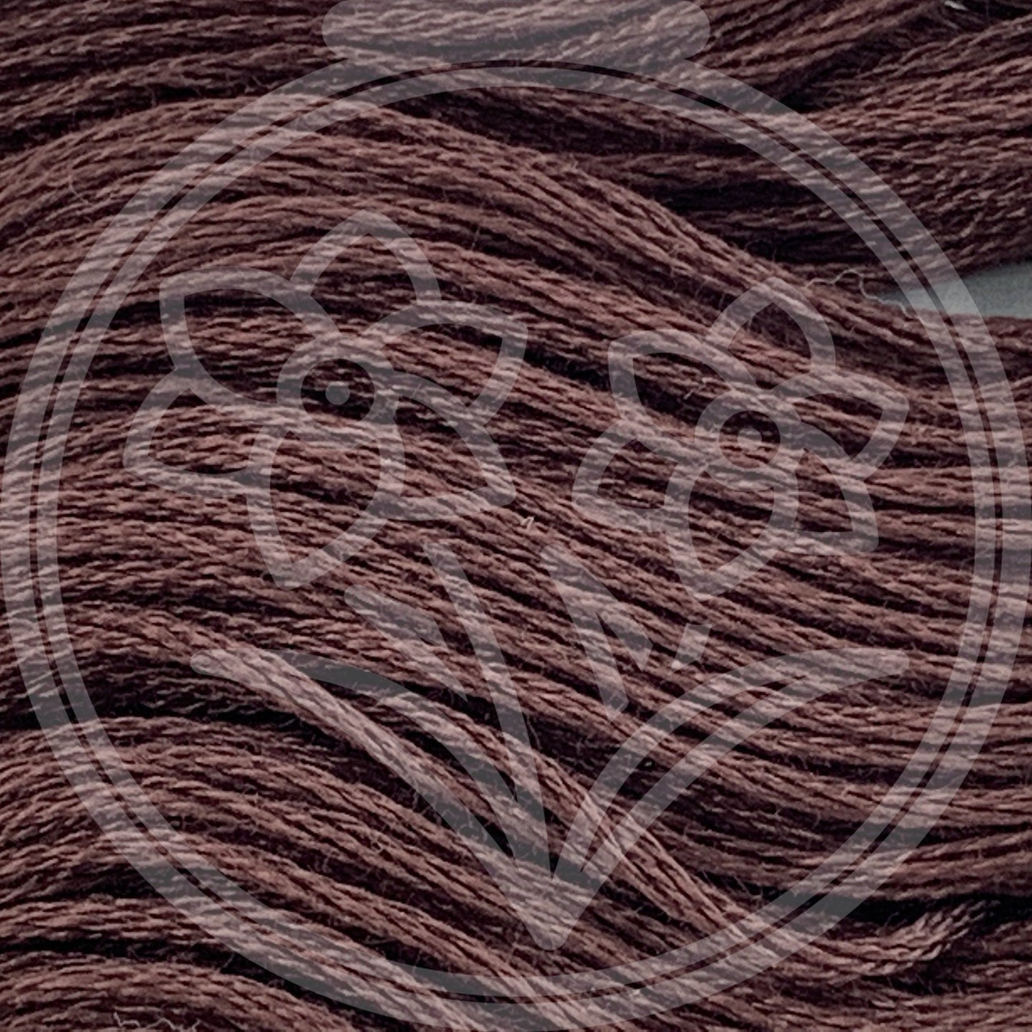 Closeup of multiple skeins, with a logo watermark