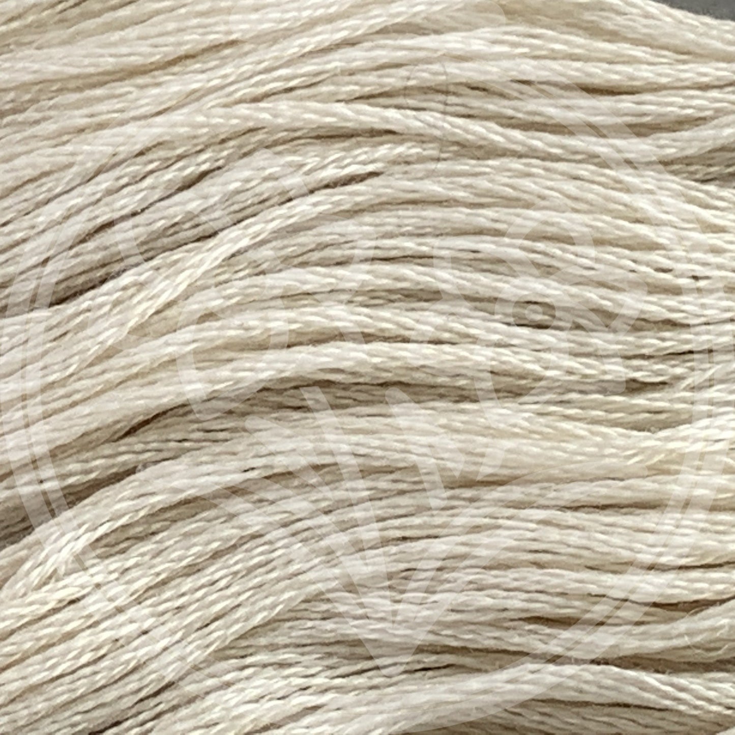 Closeup of multiple skeins, with a logo watermark