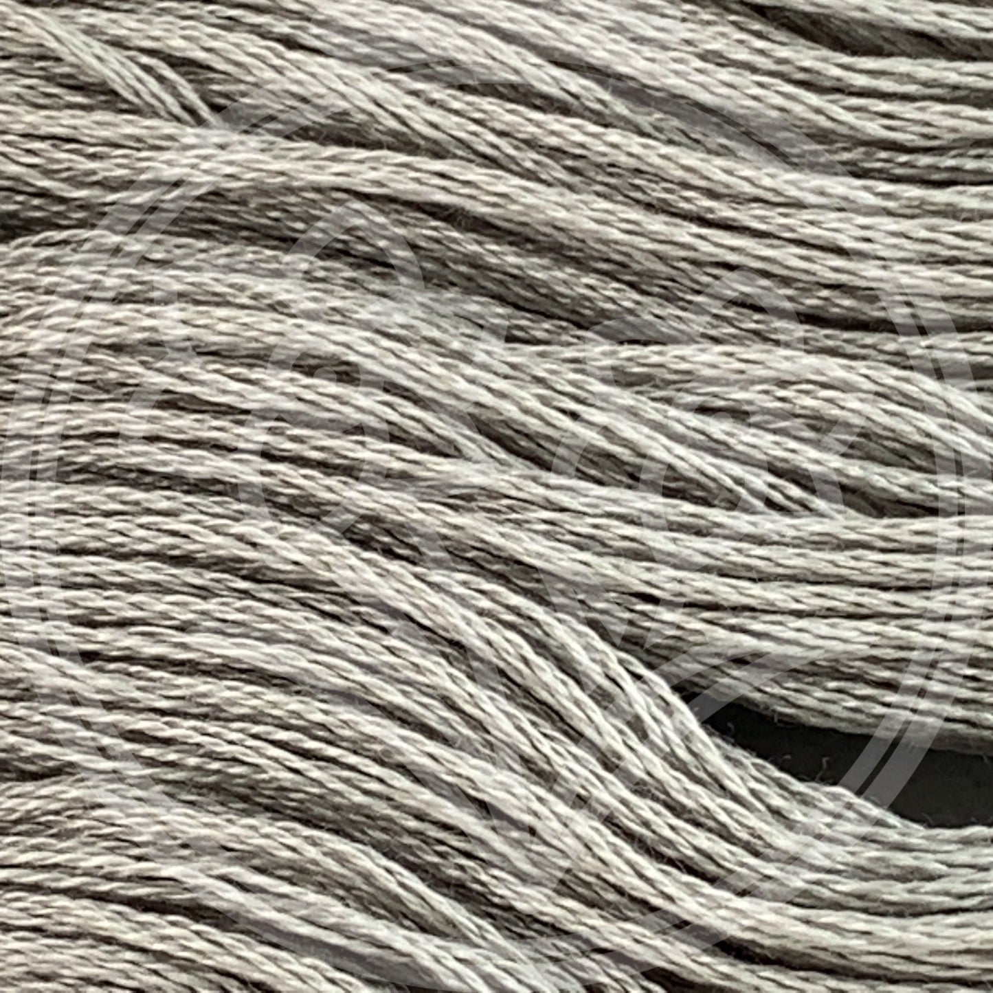 Closeup of multiple skeins, with a logo watermark