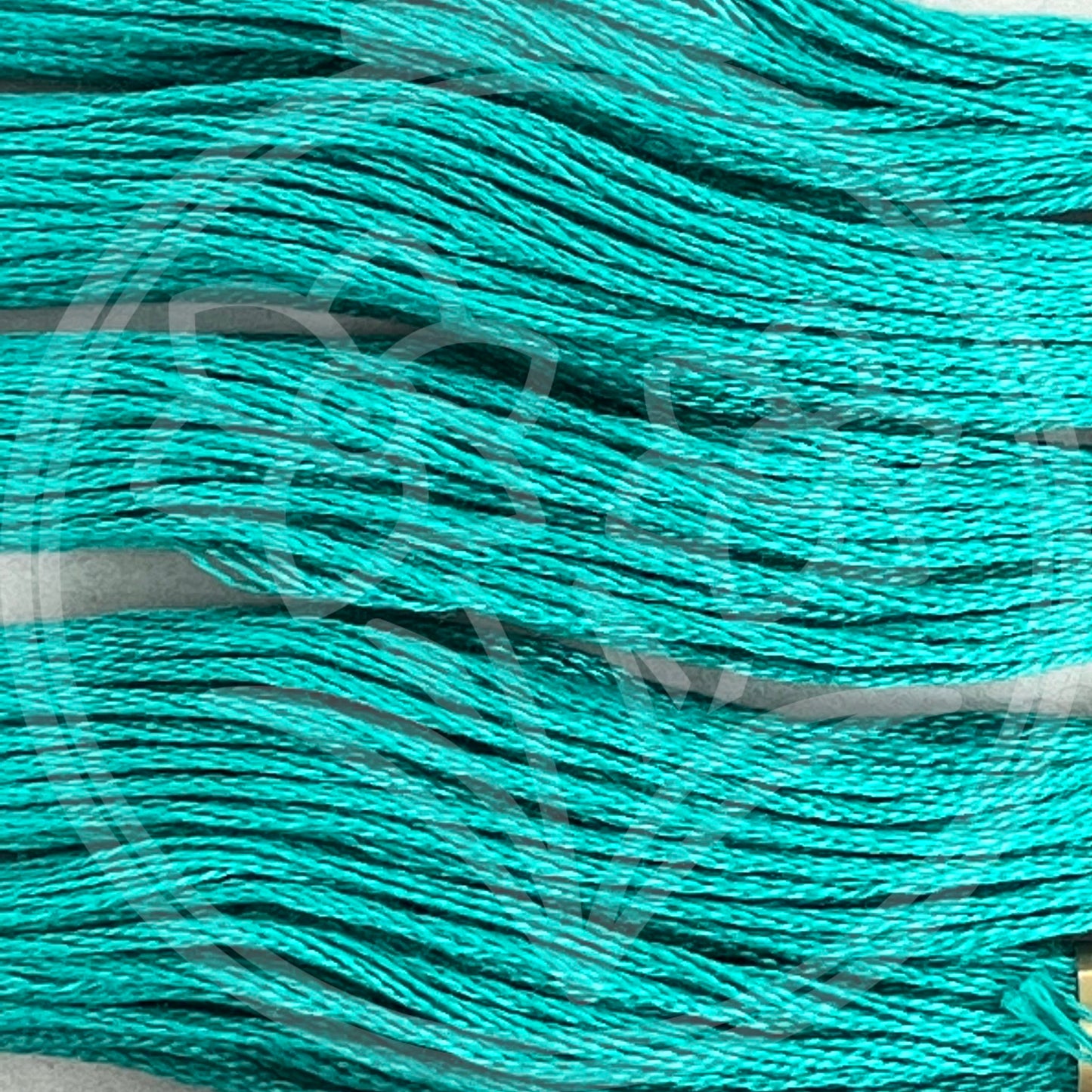 Closeup of multiple skeins, with a logo watermark
