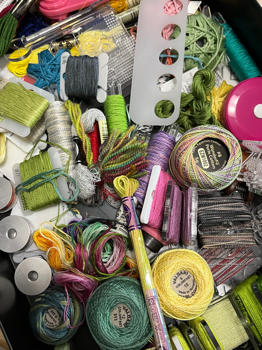 A highly disorganized stash of floss and embroidery thread