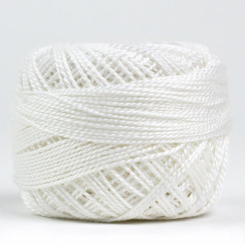 Side view of Perle cotton ball on white background to show color