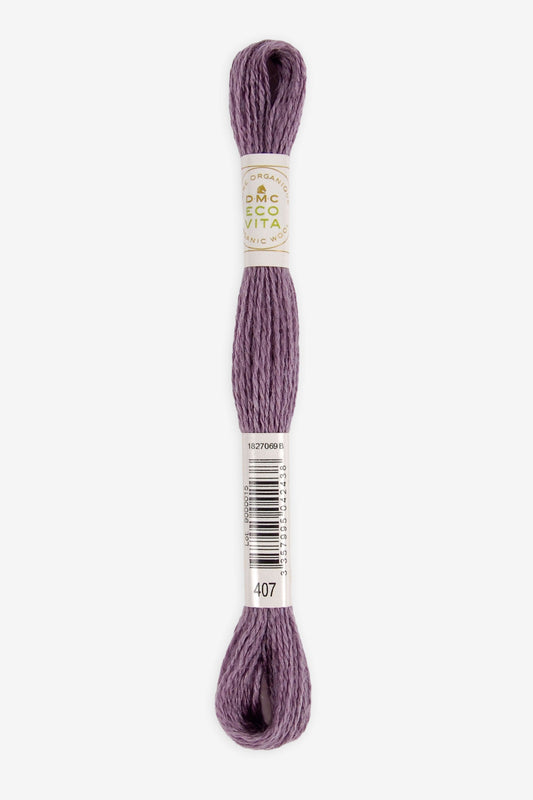 Single skein of Eco Vita Crewel Wool thread from DMC in color #407 against a white background
