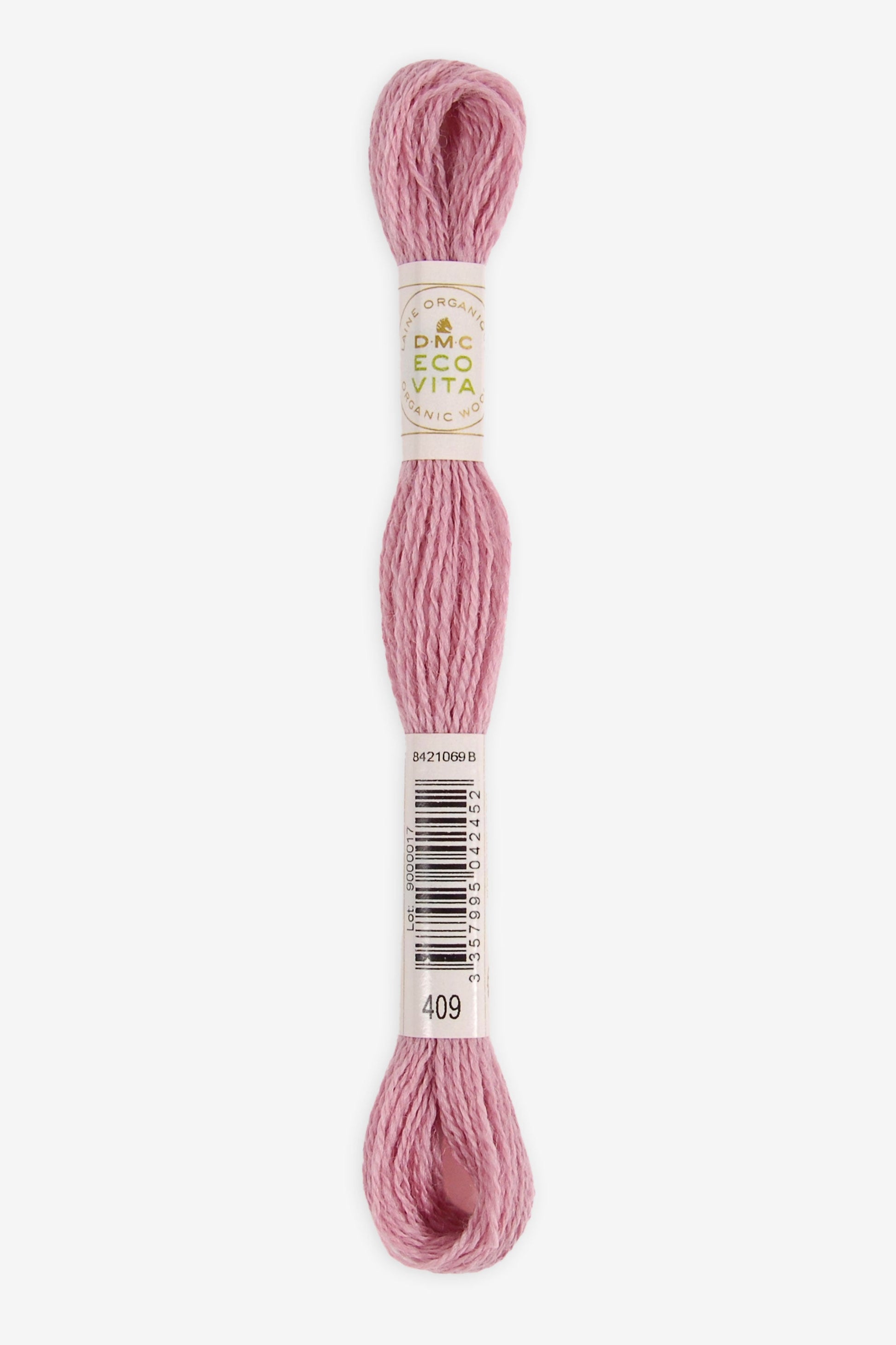 Single skein of Eco Vita Crewel Wool thread from DMC in color #409 against a white background