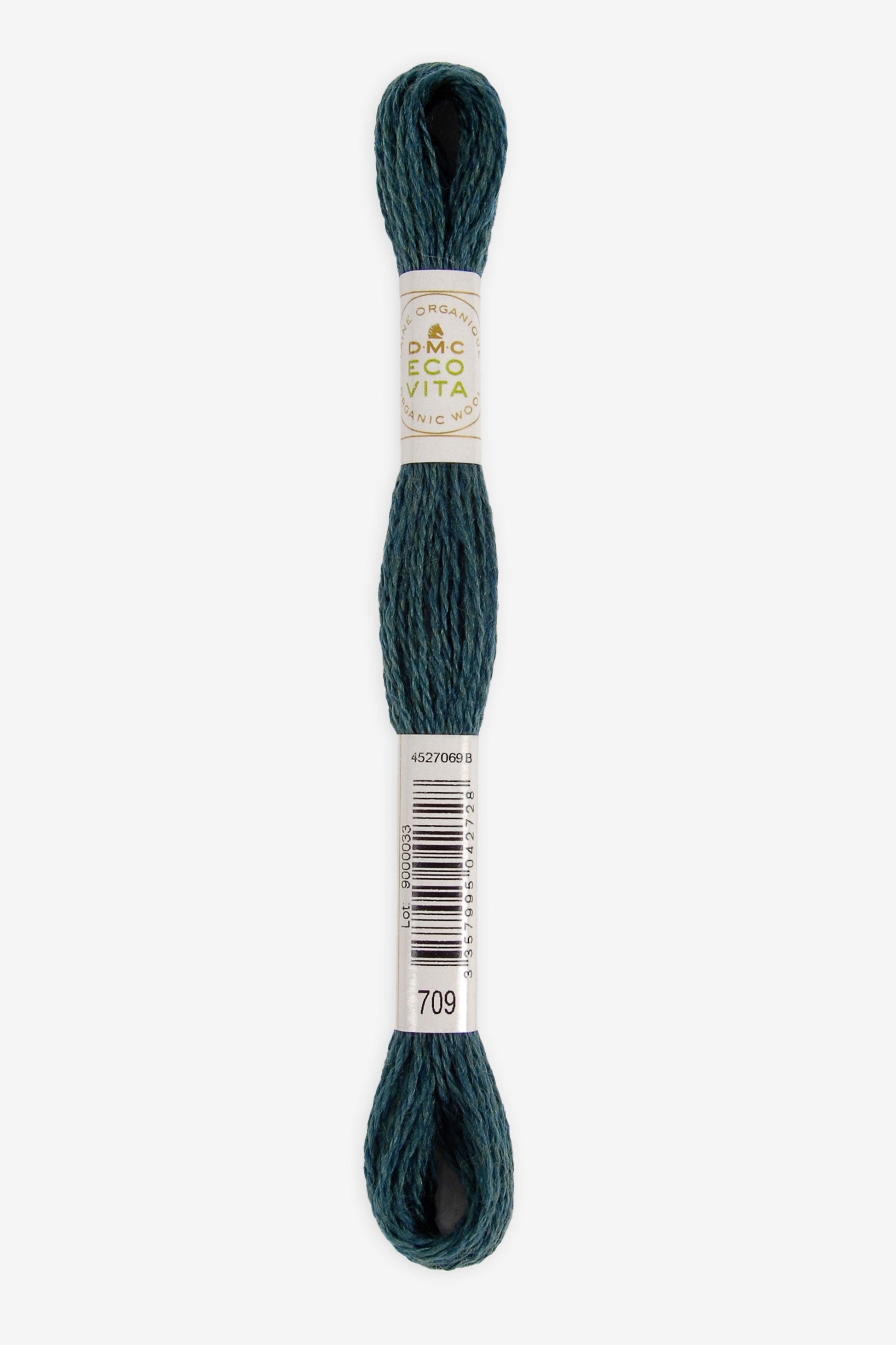 Single skein of Eco Vita Crewel Wool thread from DMC in color #709 against a white background