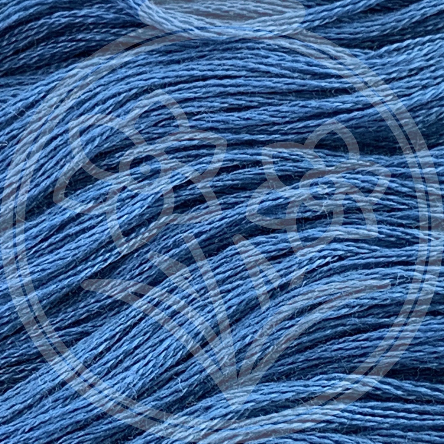 Closeup of multiple skeins, with a logo watermark