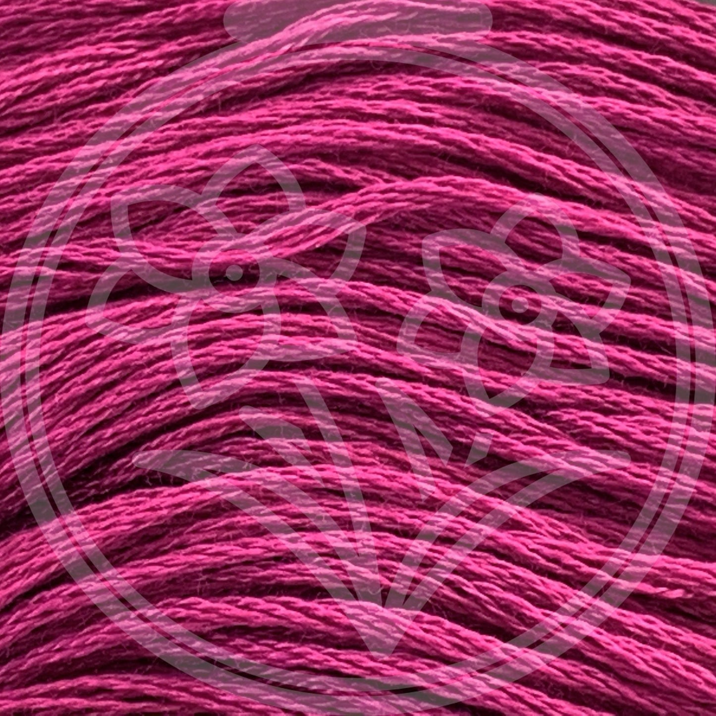 Closeup of multiple skeins, with a logo watermark