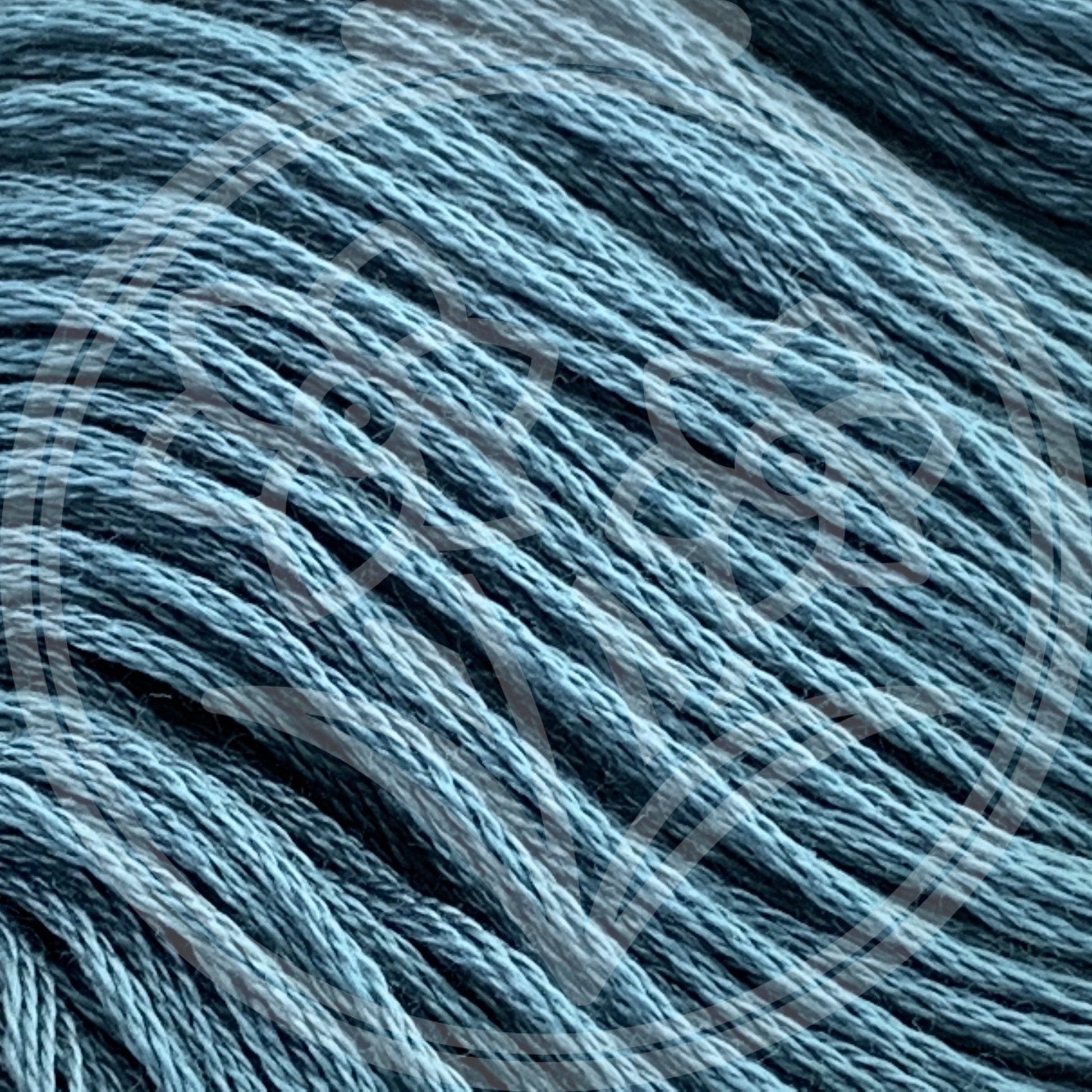 Closeup of multiple skeins, with a logo watermark