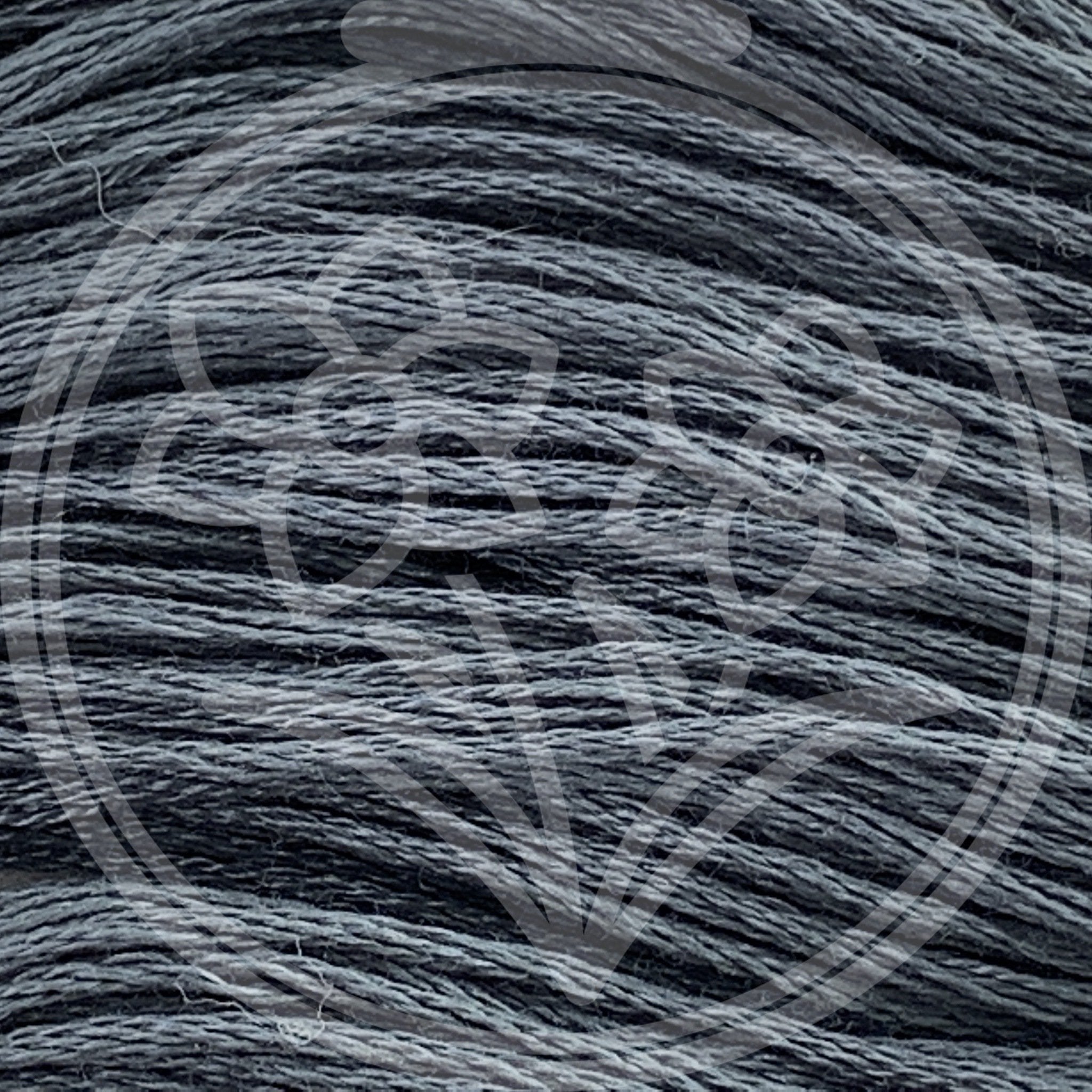Closeup of multiple skeins, with a logo watermark