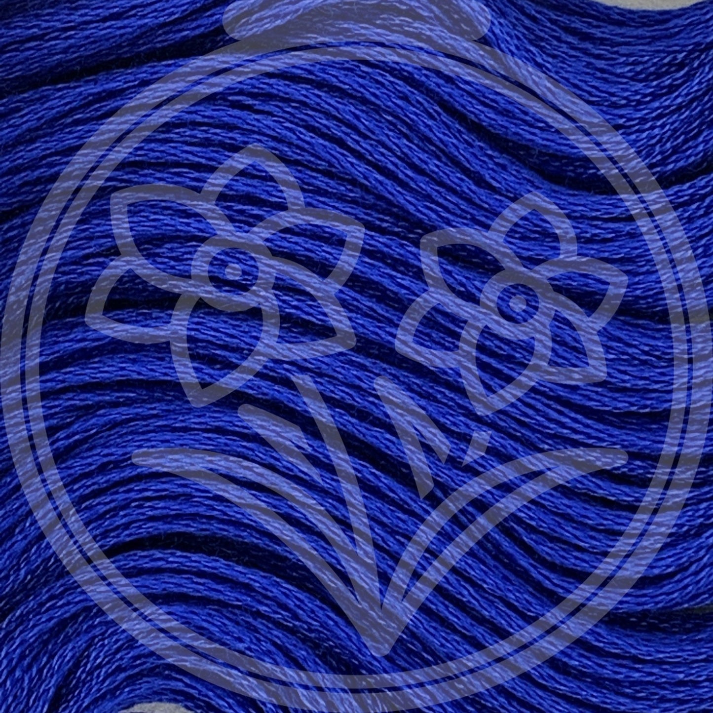 Closeup of multiple skeins, with a logo watermark