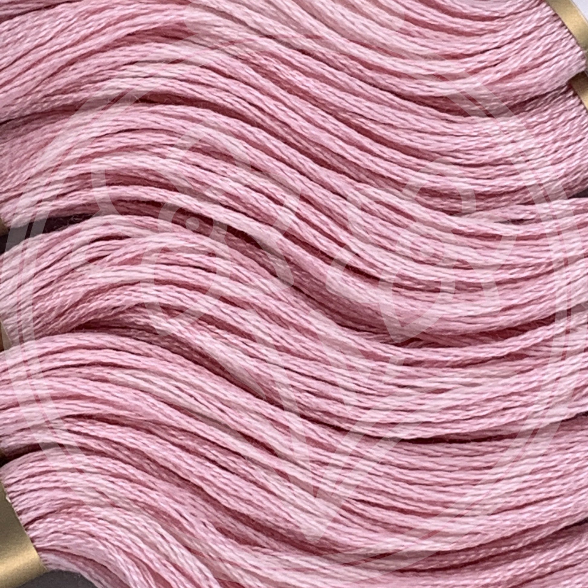 Closeup of multiple skeins, with a logo watermark