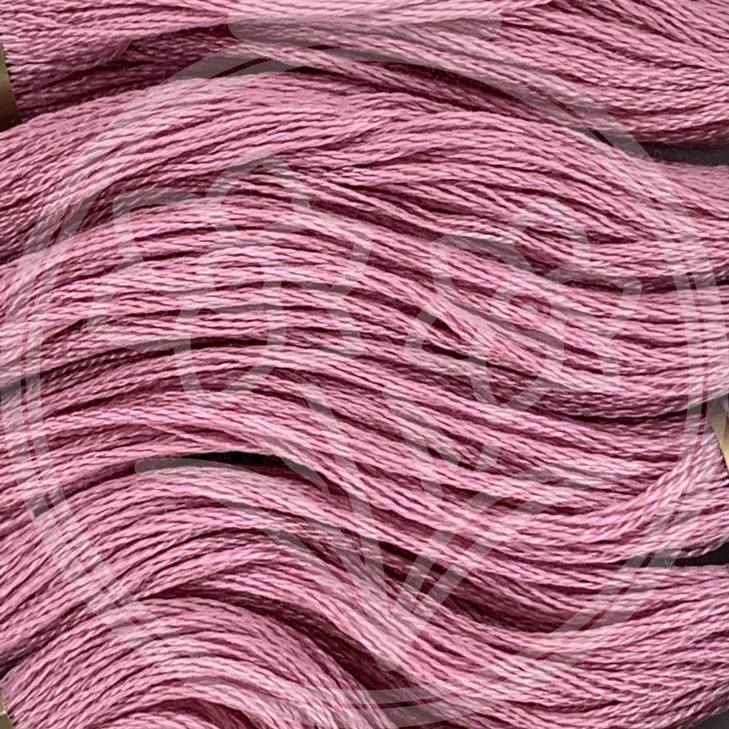 Closeup of multiple skeins, with a logo watermark