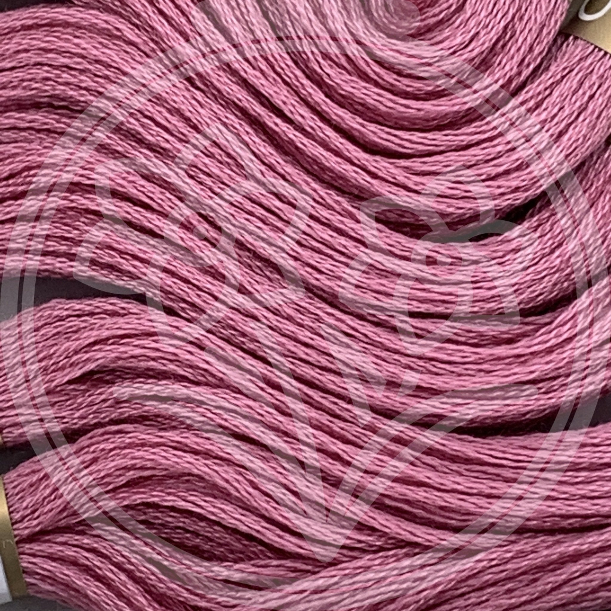 Closeup of multiple skeins, with a logo watermark