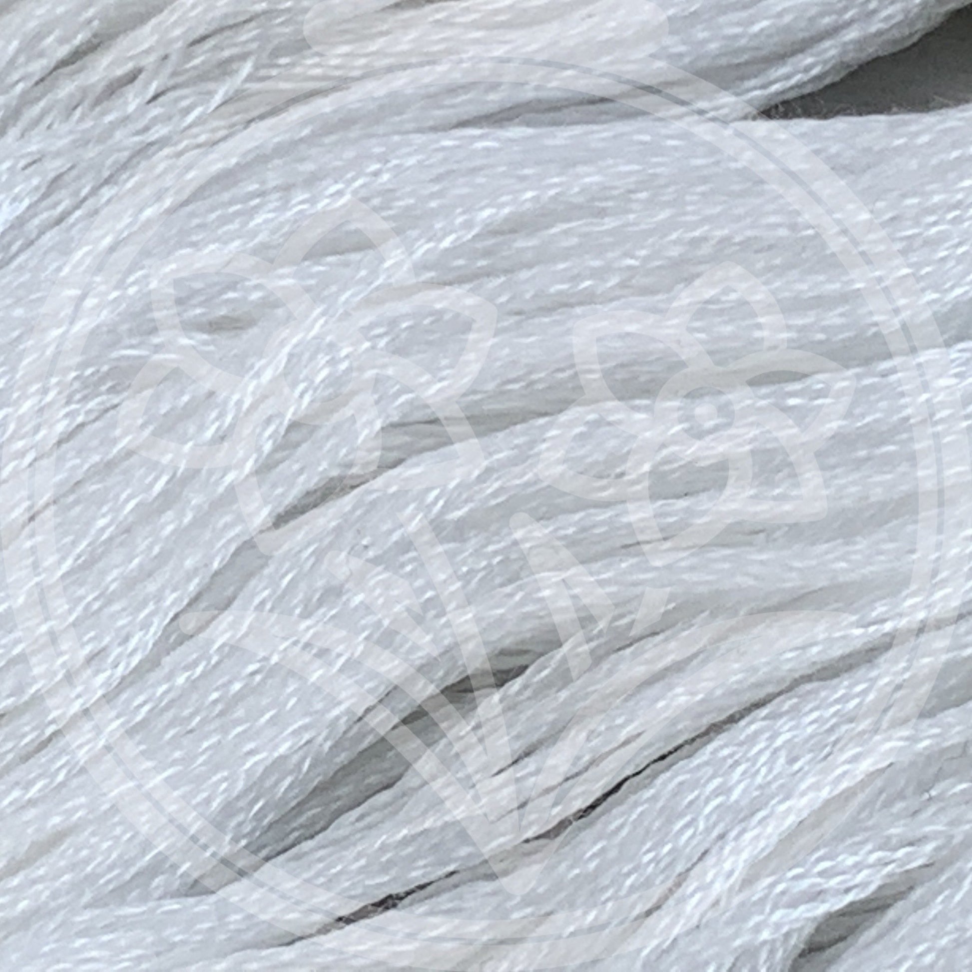 Closeup of multiple skeins, with a logo watermark