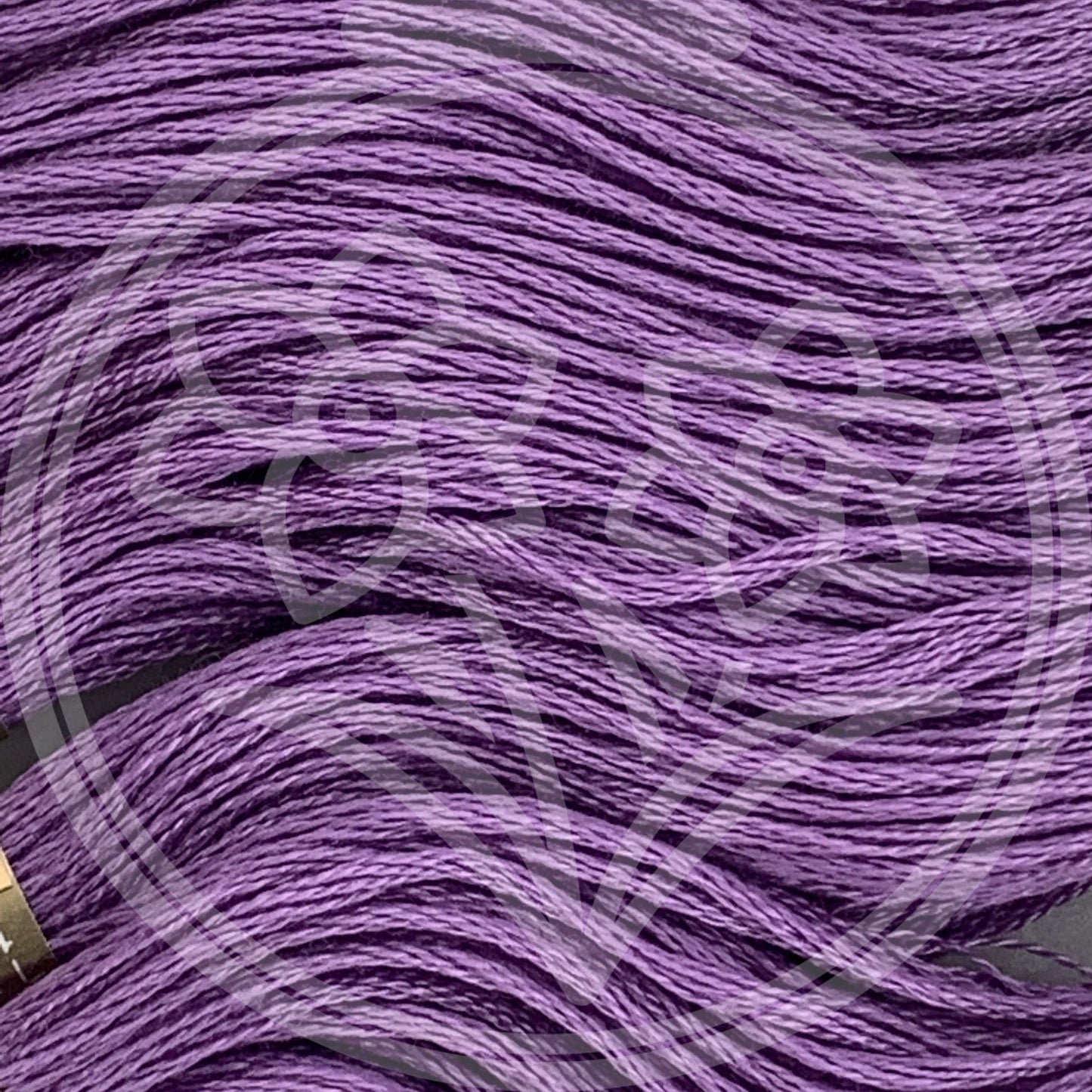 Closeup of multiple skeins, with a logo watermark