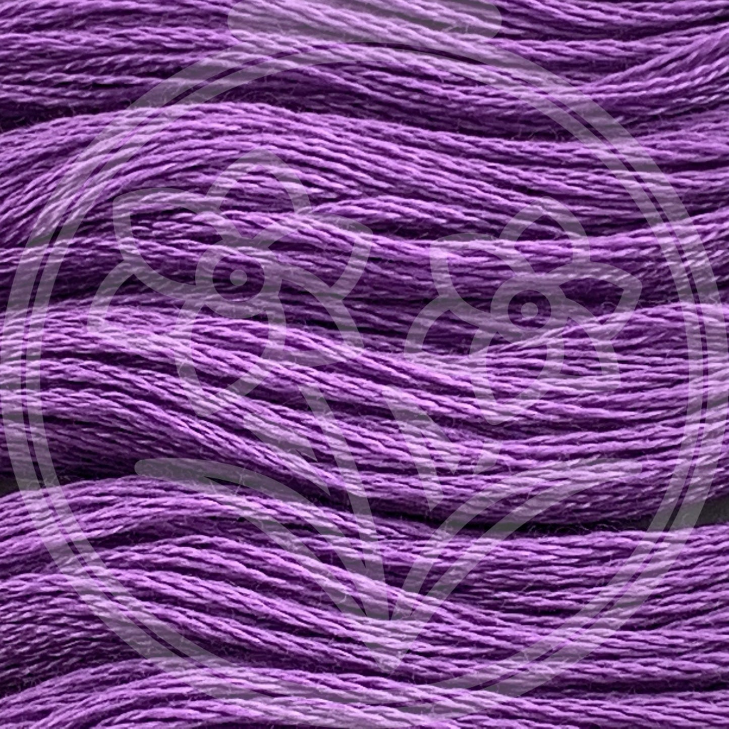 Closeup of multiple skeins, with a logo watermark