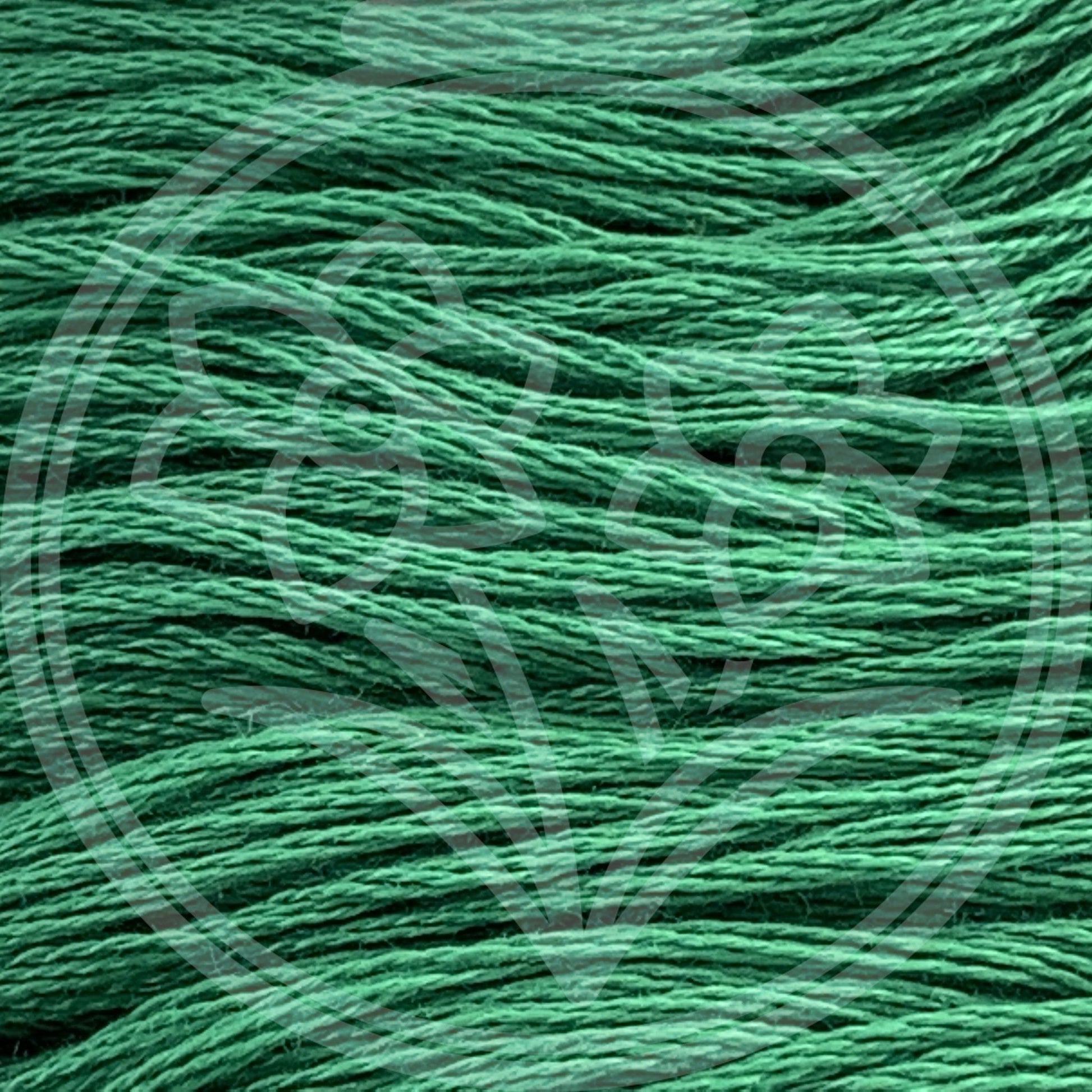 Closeup of multiple skeins, with a logo watermark