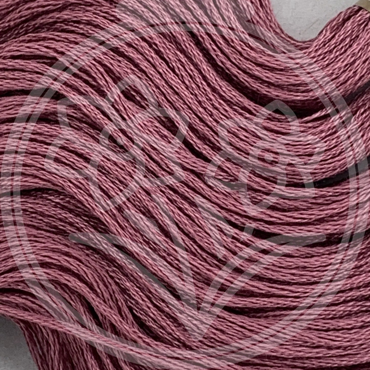 Closeup of multiple skeins, with a logo watermark