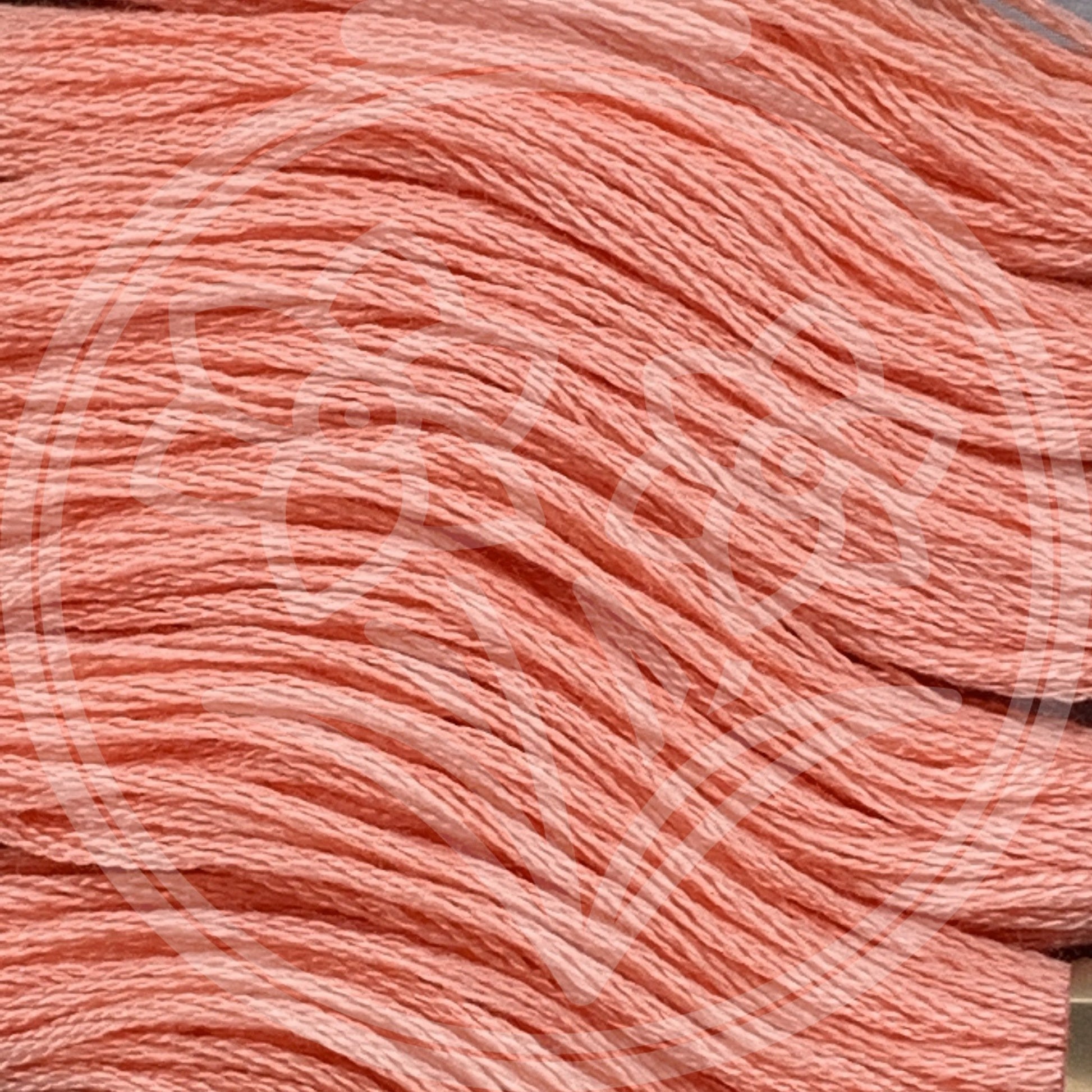 Closeup of multiple skeins, with a logo watermark