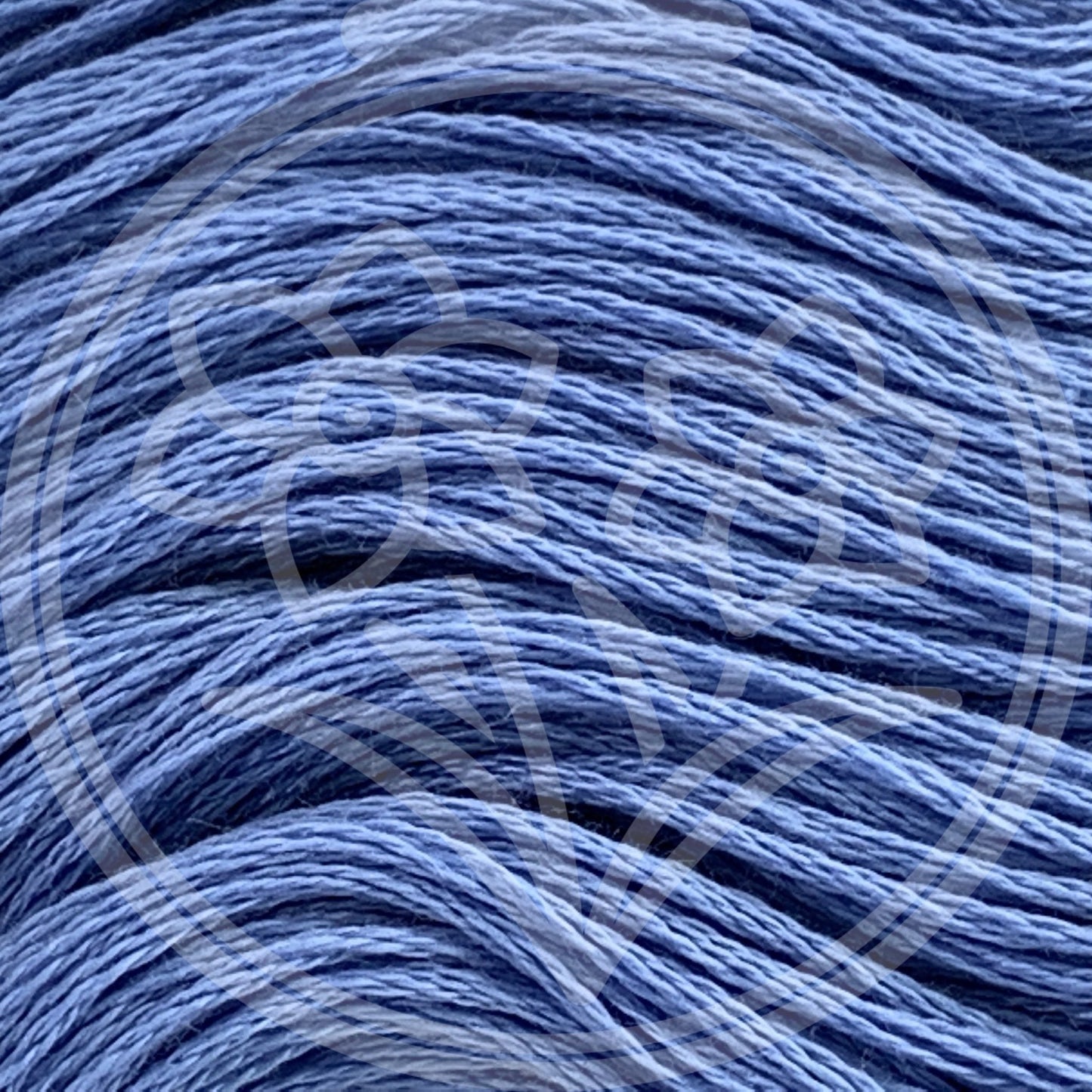 Closeup of multiple skeins, with a logo watermark