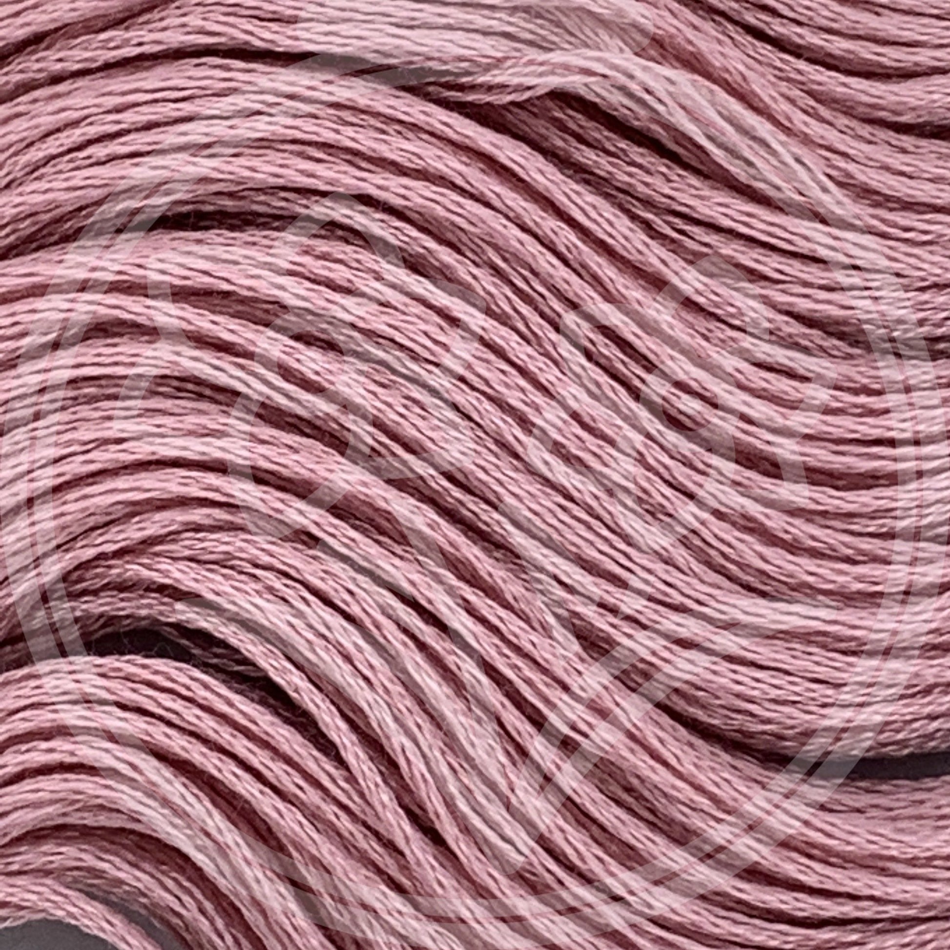 Closeup of multiple skeins, with a logo watermark