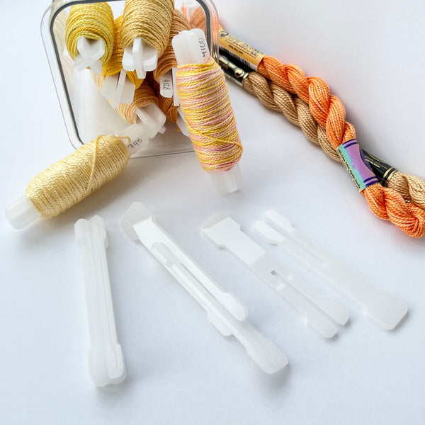 Bobbin Pegs, set of 7, milky white
