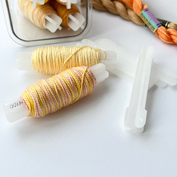 Bobbin Pegs, set of 7, milky white